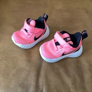 Nike Revolution in Pink size 2C NIB